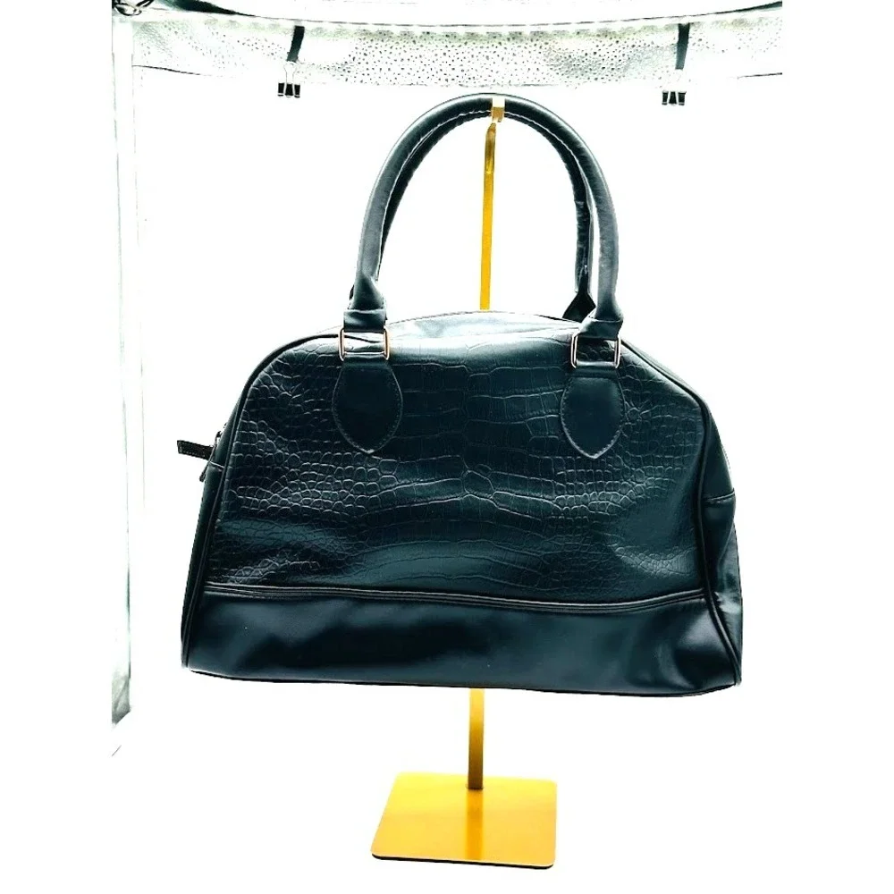 Premium overnight bag complete with high-heat flat iron